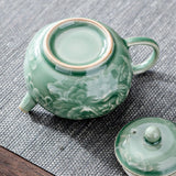 Load image into Gallery viewer, 150ml Yue Kiln Celadon Ceramic Teapot Handmade Engraving Dargon Tea Maker Small Teapot with Filter Hole Household Kung Fu TeaSet